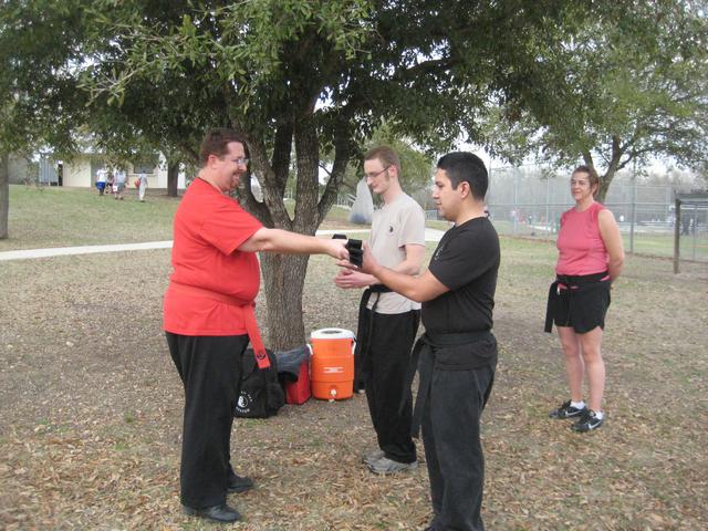 Guy Nuesca Jr. and Robert L. Zang Receiving their Sensei Belts